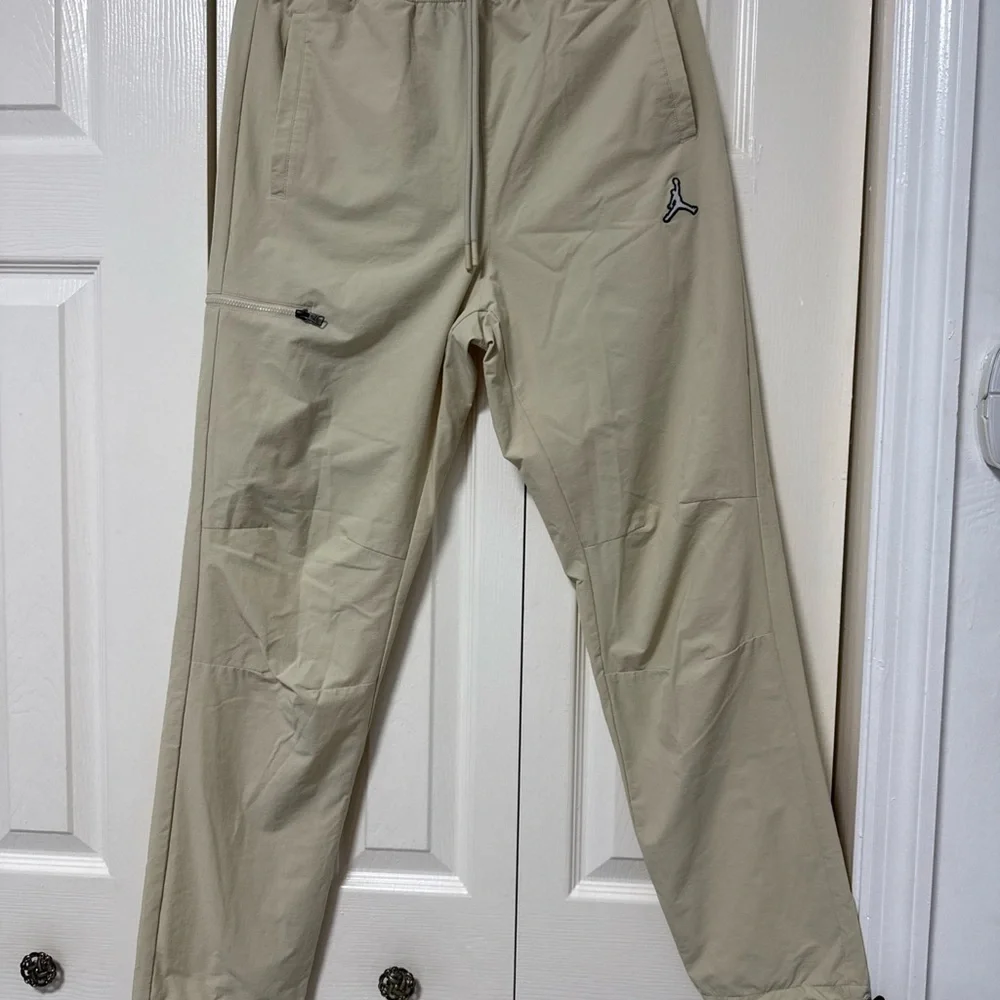 Jordan Men's Joggers in Beige with Black Jumpman A-11